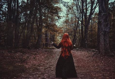 Witch with missing head in the woods